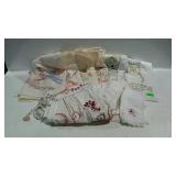 Linens group, early spoons, and cloths with