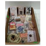 Collection of doll house accessories, still in