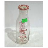 Dairy bottle - quart size Queen City Dairy,