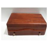 Silver chest with bottom drawer for extra storage