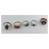 Five costume rings