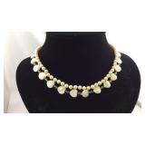 Two beaded necklaces one is mother of pearl