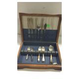 Silver Chest with 26pcs of plated spoons, and
