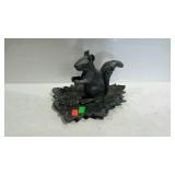 Squirrel figure nut cracker on leaf design dish
