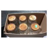 Six half gallon clear canning jars, jars are nice