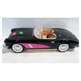 Corvette car Barbie doll type black with pink