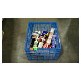 Plastic milk crate with misc rubes of sealant,