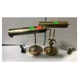 Two brass finish desk lights
