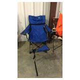Blue folding lounge type camping chair with