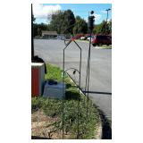 Small metal garden Trellis with bird on top,