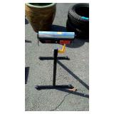 Plastic/paper roller on stand