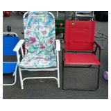 Two folding beach chairs