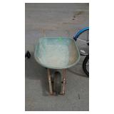 Green wheel barrow