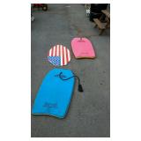 Group lot, includes two boogie boards and a skin