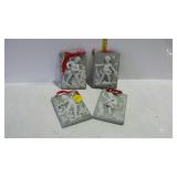Four cherub wall plaque pieces green with white
