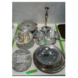 Silver plated dishwares, trivets, serving bowls