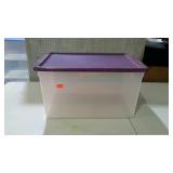 Tote with purple lid. 66 quart.