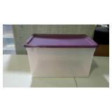 Tote with purple lid. 66 quart.