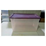 Tote with purple lid. 66 quart.