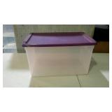 Tote with purple lid. 66 quart.