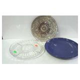 Three snack trays, 2 glass and one blue speckled