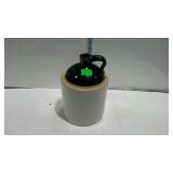 Whiskey sipping jug brown over white pottery half