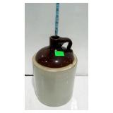 Crockery whiskey sipping jug brown over white