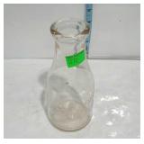 Milk Bottle, pint size with raised lettering " A