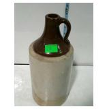 Crockery sipping jug, brown over white unusual as