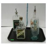 Collection of 4 whiskey bottles with paper labels