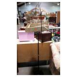 Early home decor bird cage on floor stand