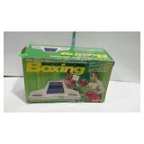 Knock Em Out Boxing Electronic Game, with the box