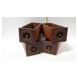 Four single sewing machine stand drawers.