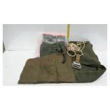 Flat of assorted military canvas items.