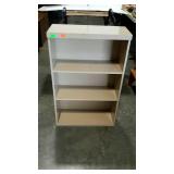 Painted book storage shelf, having 3 shelves for