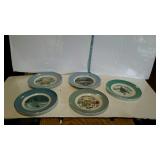 Group of five Avon collector Christmas plates.