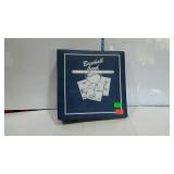 Baseball card album with baseball collector