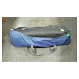 Small tent with poles and carry bag.