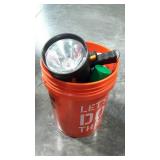 Home Depot bucket with assorted hardware items.