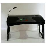 Bed tray, for food or just reading as there is an