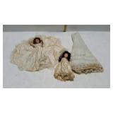 Two bride dolls and one doll under skirt, vintage