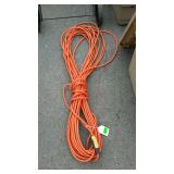 Orange electric extension cord about 50ft looks