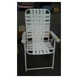 White poly folding lawn chair used okay needs