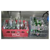 Two plastic crates of pop bottles, Pepsi,