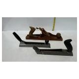 Two rasp files, and one old carpenters wood plane