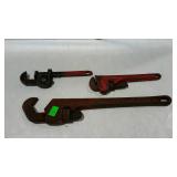 Group of three pipe wrenches. Assorted brands and