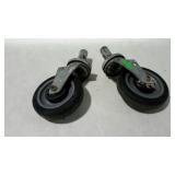 Pair of rubber caster wheels. Some cracks in