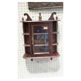 Curio cabinet, wall mount style with single center