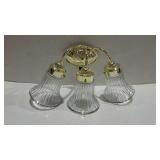 Wall light fixture. Three light sconce with glass