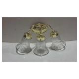 Wall light fixture. Three light sconce with glass